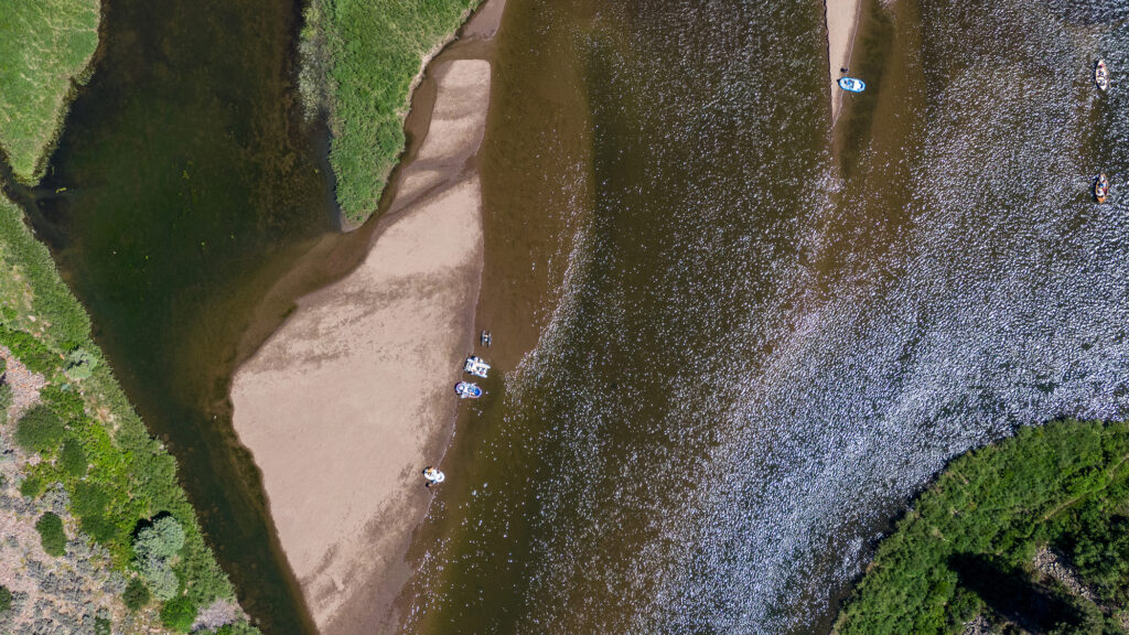 Looking down on whitewater rafts near the Pumphouse Recreation Site