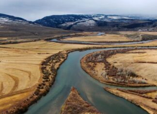 Some of the snowmelt flowing in the Blue River as it joins the Colorado River photo