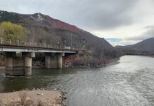 The Roaring Fork River joins with the Colorado River in downtown Glenwood Springs photo