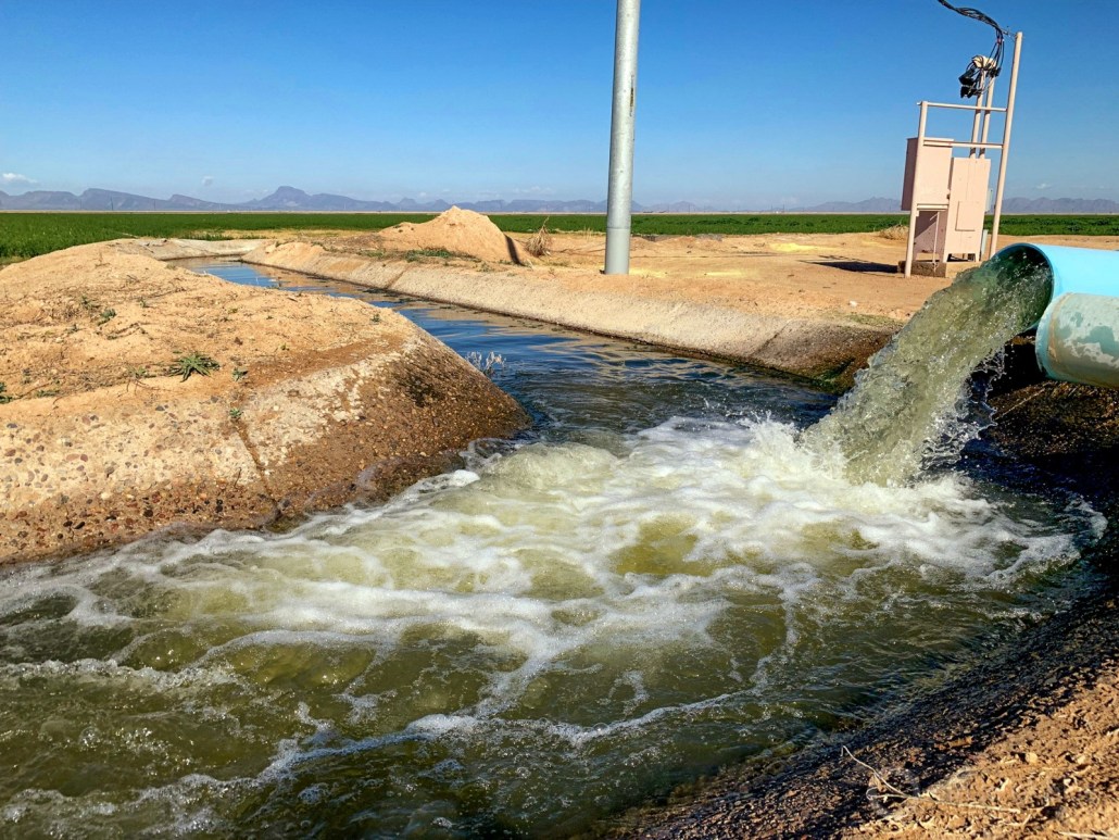 As water supplies from the Colorado River drop the demand for Arizona’s finite reserves of groundwater are increasing. Here, pumping fills an irrigation canal near Gila Bend, Ariz. Photo © Keith Schneider / Circle of Blue