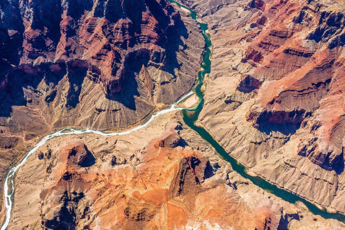 The confluence of the Colorado and Little Colorado rivers in the Grand Canyon, shown here in a September 2020 aerial photo from Ecoflight, represents an area where the humpback chub has rebounded in the last decade. That progress is now threatened by declining water levels in Lake Powell, which could lead to non-native smallmouth bass becoming established in the canyon. CREDIT: JANE PARGITER/ECOFLIGHT