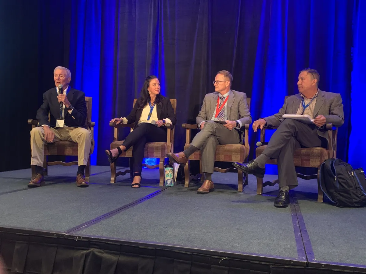 John McClow, left, moderates a panel on the Colorado River at the Colorado Water Congress summer conference in Steamboat Springs Thursday. From left: Becky Mitchell, director of the Colorado Water Conservation Board and commissioner of the Upper Colorado River Commission; Gene Shawcroft, Colorado River Commission of Utah; Tom Buschatzke, director, Arizona Department of Water Resources. CREDIT: HEATHER SACKETT/ASPEN JOURNALISM